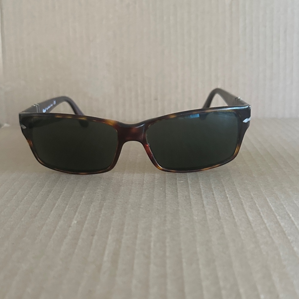Persol PO2803S sunglasses in Havana brown acetate with green lenses.